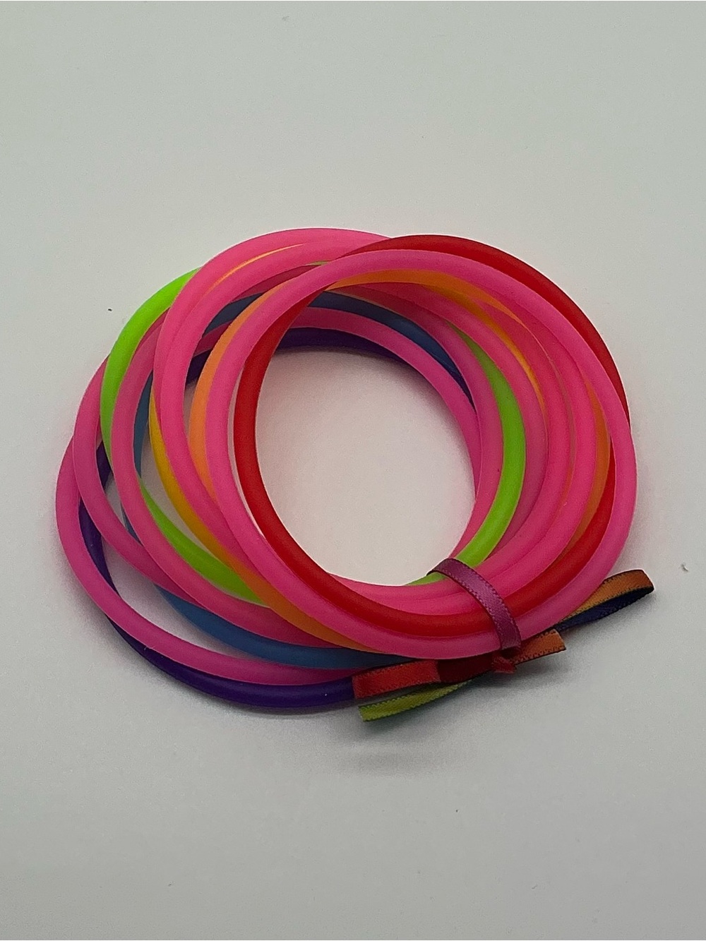 Set of 12 Neon Pink and Rainbow Jelly Bracelets